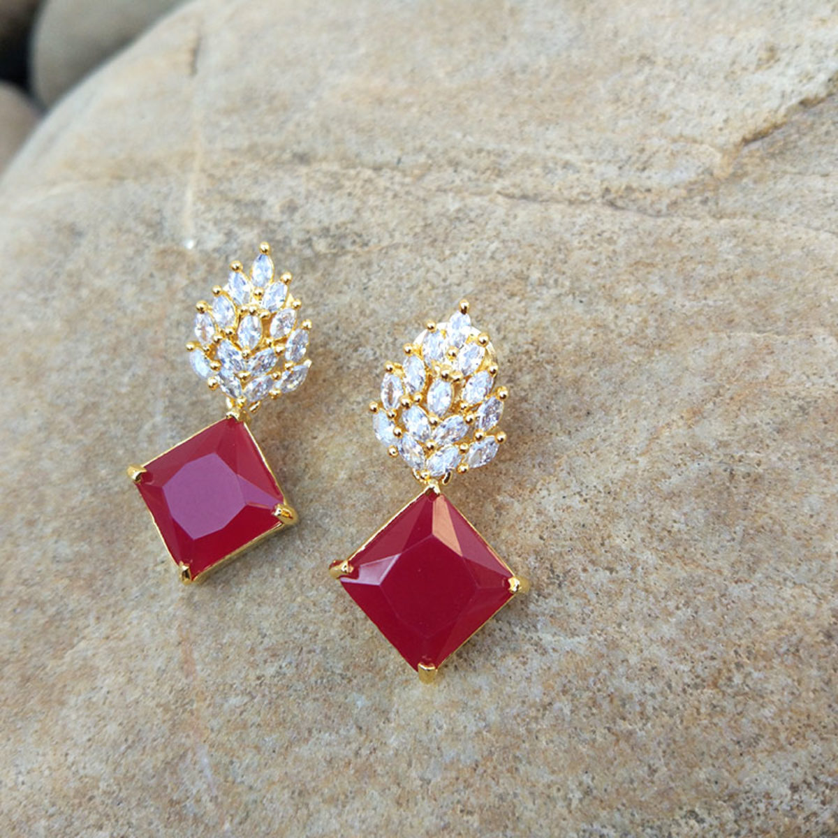 Maroon colour stone earrings discount