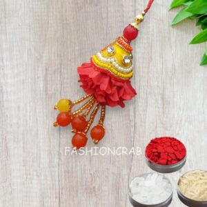 Fancy Orange Pearl Lumba Rakhi