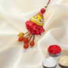 Fancy Orange Pearl Lumba Rakhi