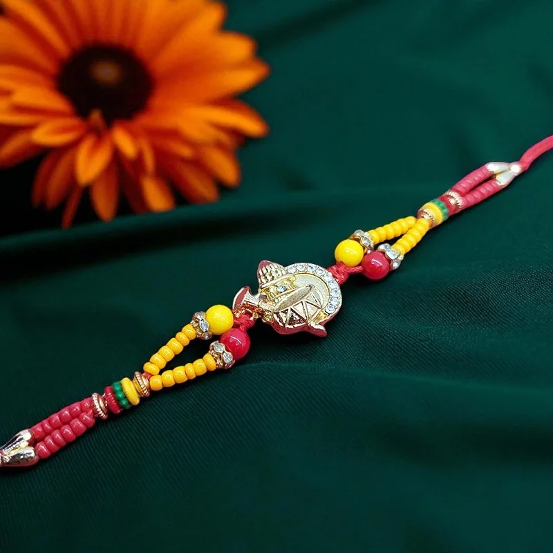 Beautiful Golden Kalash Lumba Rakhi Set